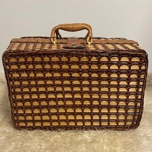 Cute vintage wicker picnic basket with reusable plates